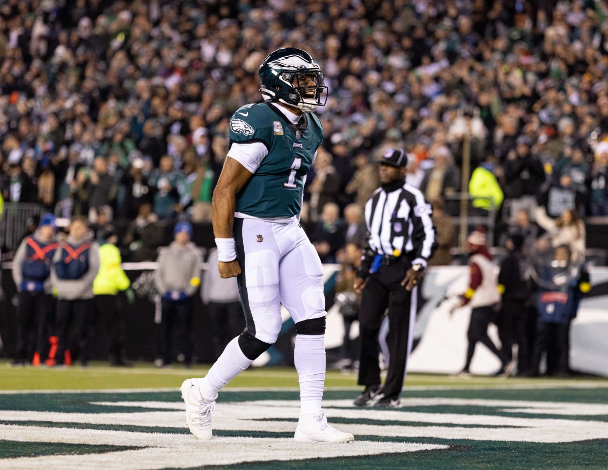 Jalen Hurts celebrates his 7th rushing TD of season, coming in Week 10 vs. Commanders